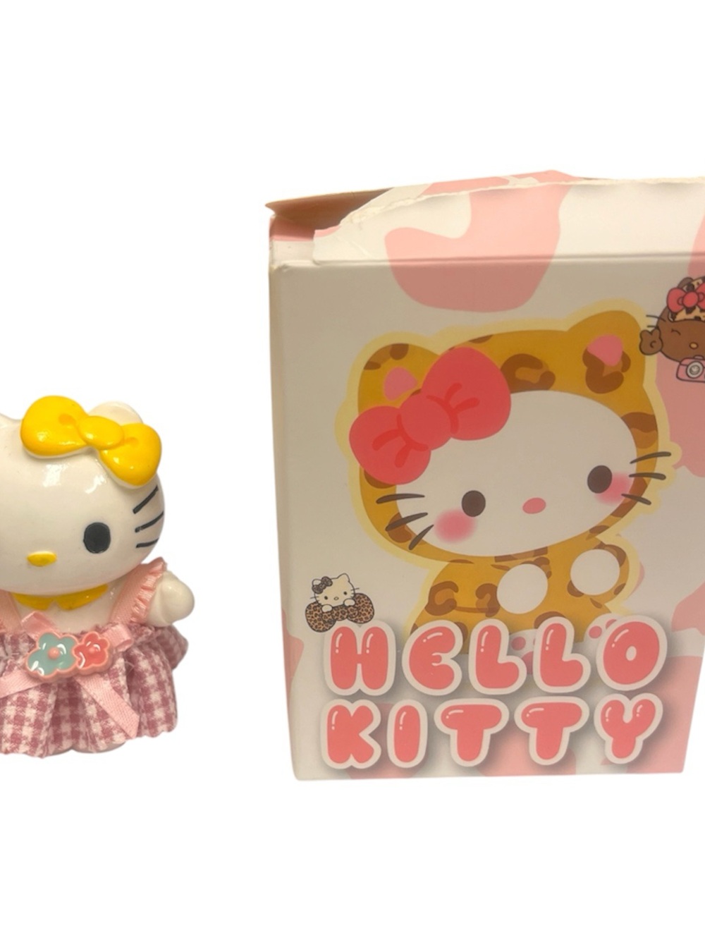 Hello Kitty Pink Dress Figurine with Yellow Bow - Cute Collectible